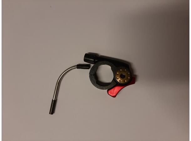 Kindshock lockout hendel for styre 